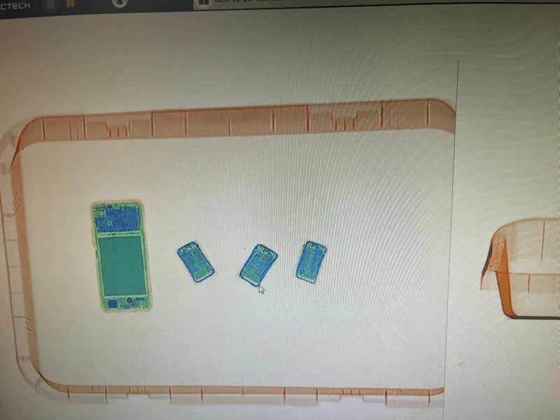 X-ray screen at Goa airport showing electronic devices found in a passenger's bag