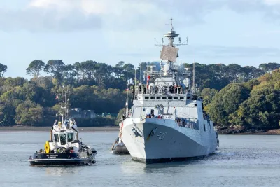 INS Trishul arriving at Plymouth, UK, escorted by a tug for Exercise Konkan-26
