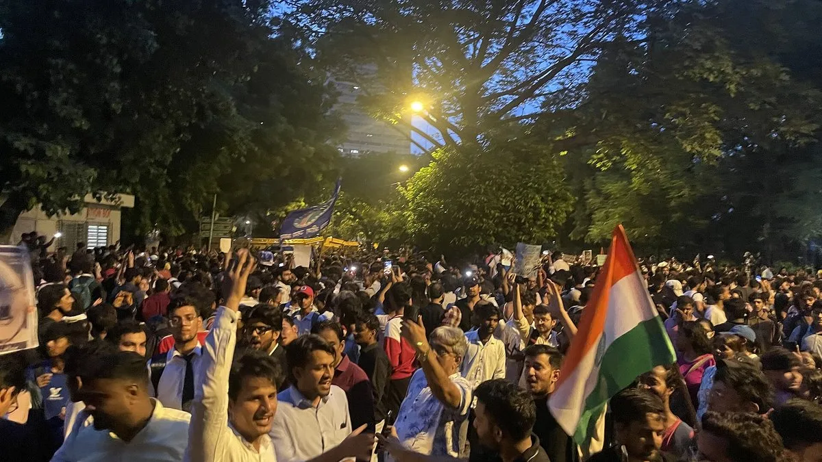 File photo: a large crowd of young protesters with a tricolour at Jantar Mantar, New Delhi, in the evening