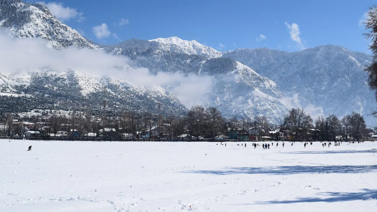 Snow-covered Chowgan ground and mountains in Kishtwar, Jammu and Kashmir