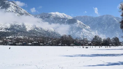 Snow-covered Chowgan ground and mountains in Kishtwar, Jammu and Kashmir