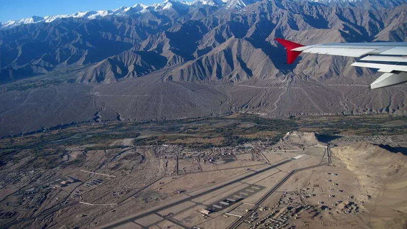 Aerial view of Leh's Kushok Bakula Rimpochee Airport with the Ladakh mountains behind
