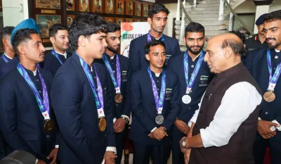 Defence Minister Rajnath Singh interacting with armed forces medal winners of the 2026 Asian Games in New Delhi