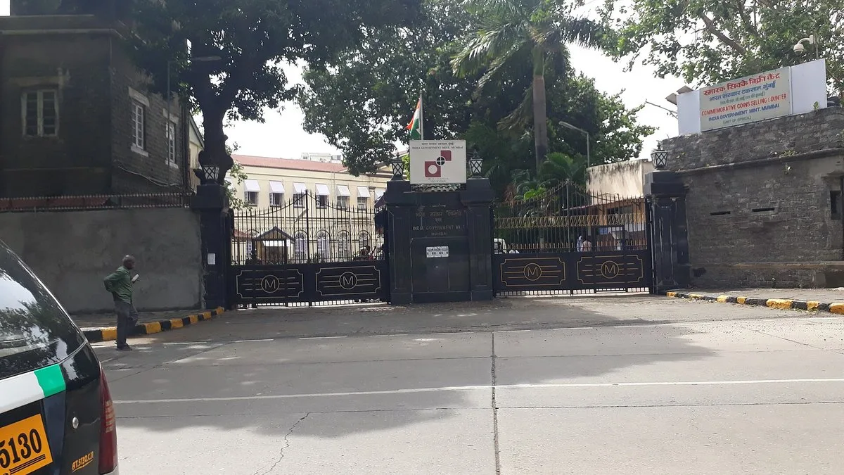 Gate of the Reserve Bank of India premises in Mumbai with the RBI logo
