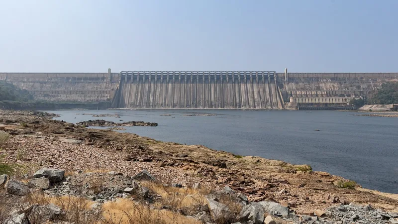 Nagarjuna Sagar dam on the Krishna river with all crest gates closed and low water near the banks