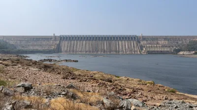 Nagarjuna Sagar dam on the Krishna river with all crest gates closed and low water near the banks