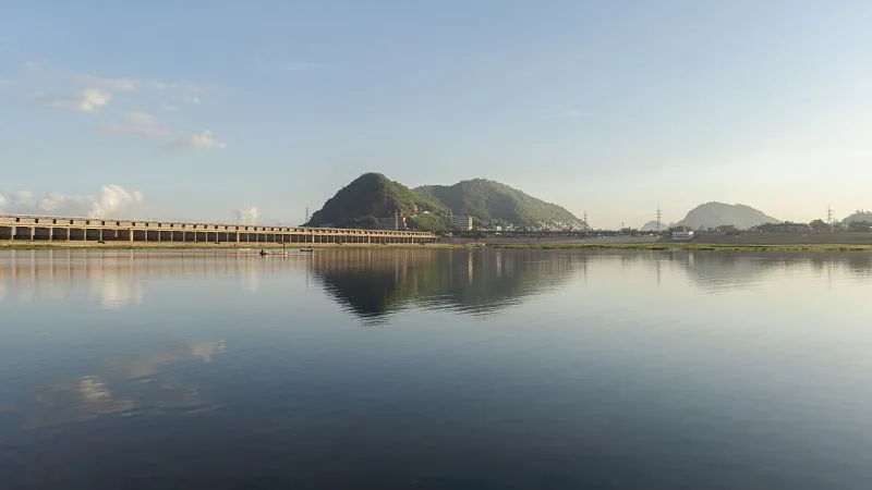 Indrakeeladri hill and Prakasam Barrage across the Krishna river in Vijayawada